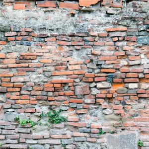 Badly stacked brick wall background