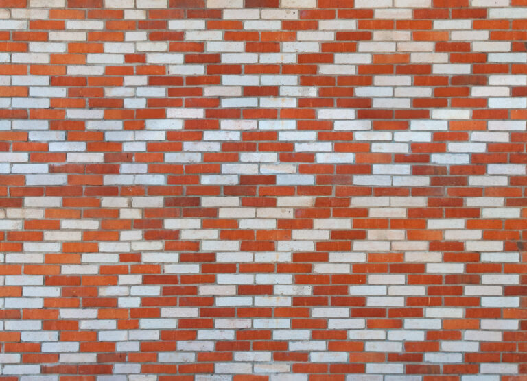 Brick wall pattern in red and white bricks