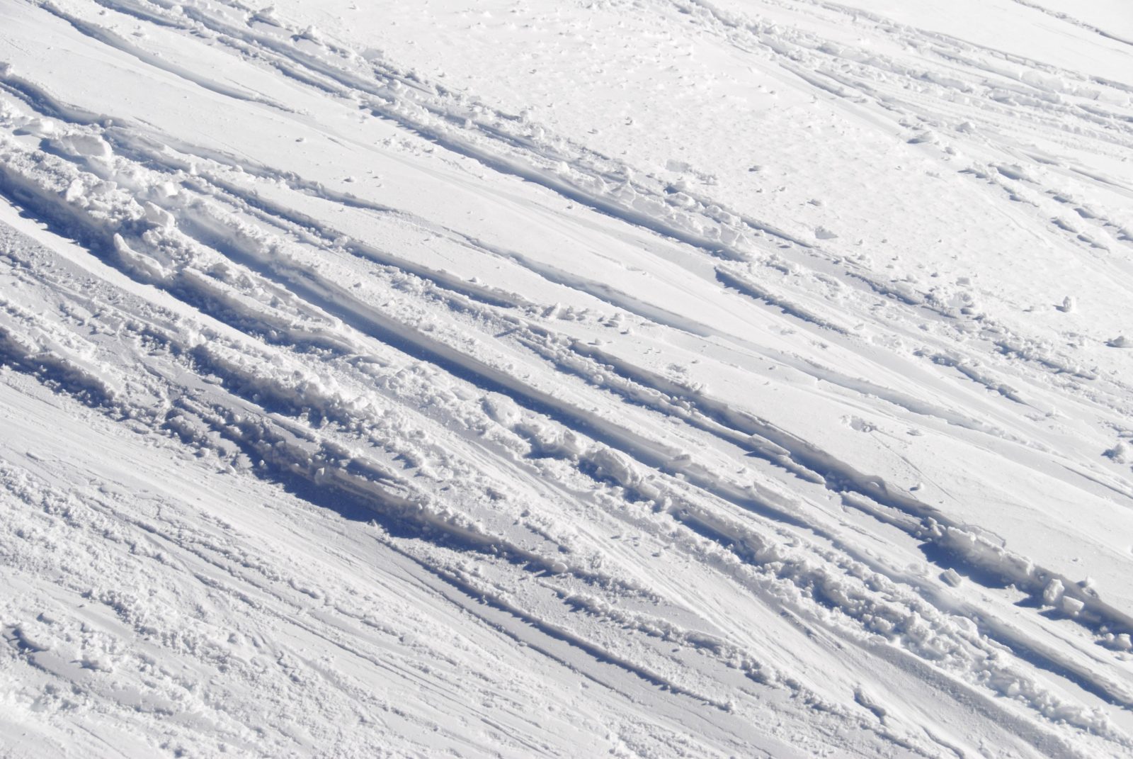 Snow ski tracks texture backdrop - patternpictures.com
