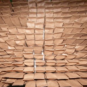 huge number of craft paper bags background seen from the top