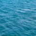 Intense blue ocean background water render